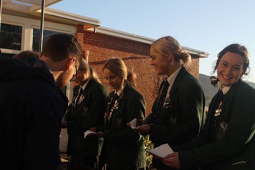 Receiving a piece of Columba Day cake