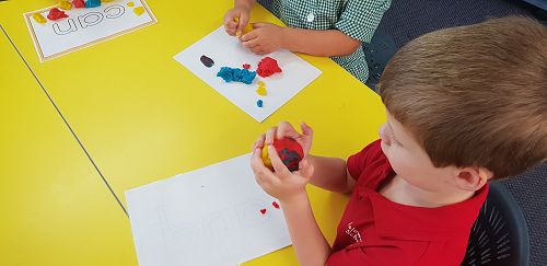 Mixing colours with playdough