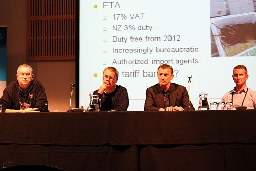 Issues of the day can be seen on-screen behind a panel of NZ exporters at the inaugural Trans-Tasman Conference in Blenheim, 2011. 