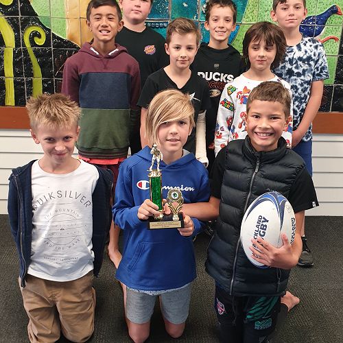 The Warhogs with their trophy from the Rippa Rugby tournament!