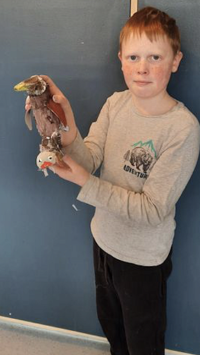 Oliver shares his kereru and mouse