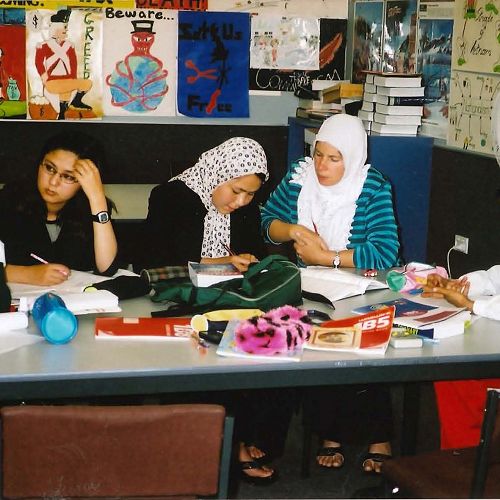 Suhaylah with homework students