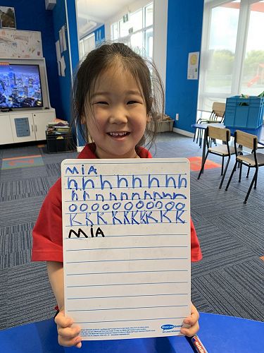 Mia is getting very good at forming her letters.
