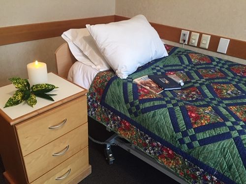 Pictured above is a beautiful handmade quilt. These vibrant quilts were generously donated to us for the Spiritual Wellness Project.