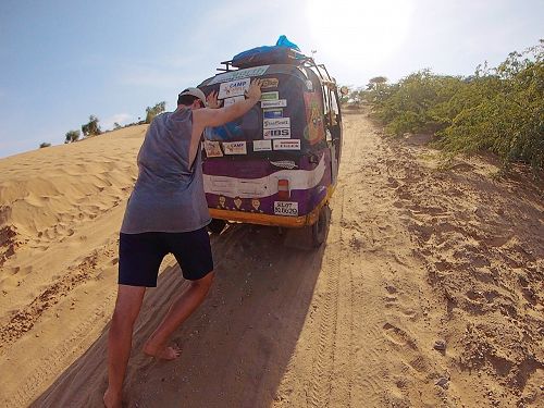 Sean pushing Rocky after Google maps took them on an adventure