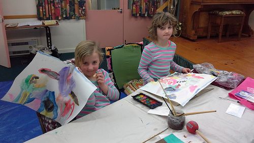 Alicia and Sophie join in the painting during scho