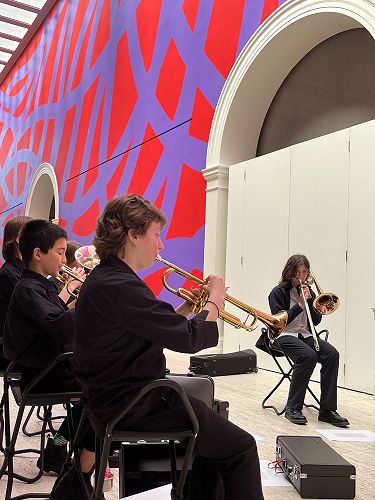 Brass performing next to Sol LeWitt Wall drawing #955, Loopy Doopy (red and purple) 2000