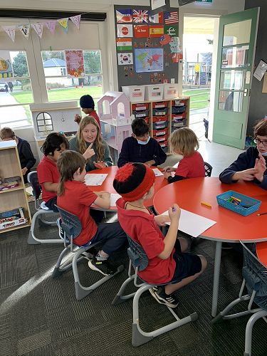 Teaching NZSL in our Wharenui Classes