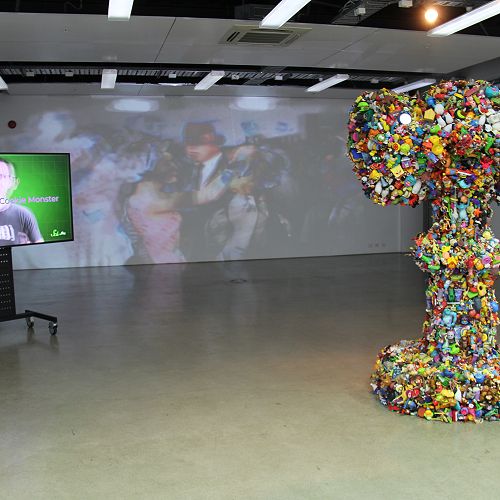 Left and background: new works for KAPITAL (2022) by David Green. Right: Choking Hazard (2022) by Michele Beevors.