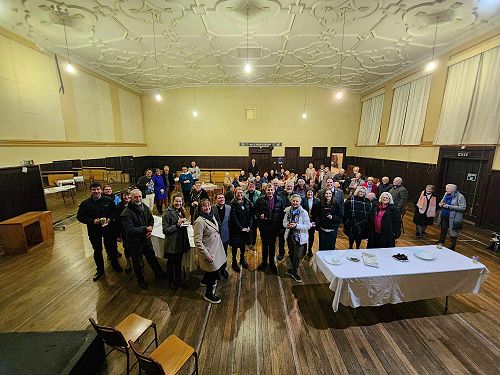 Celebrating with Ben, Stephanie and Bishop Peter after the service.