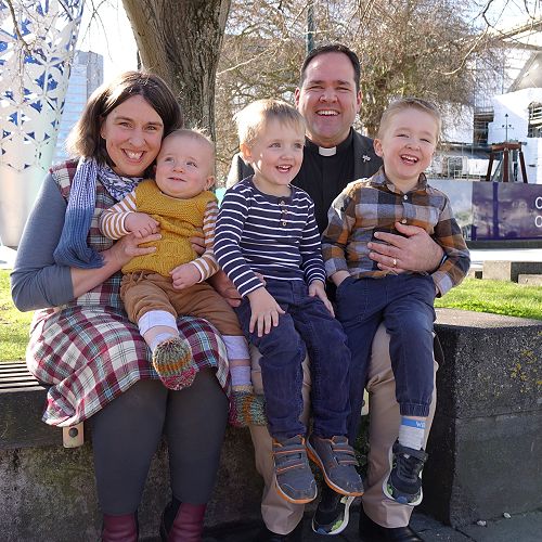 The Rev'd Canon Ben Truman with his family