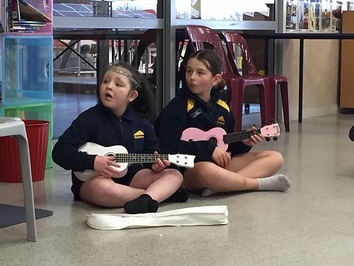 Romy playing ukelele