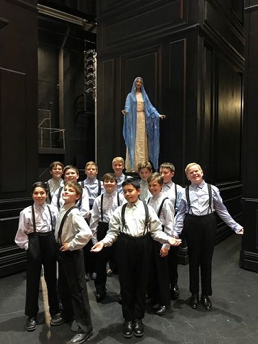 Jayden Walker with the cheeky lads of the Tosca Opera Chorus