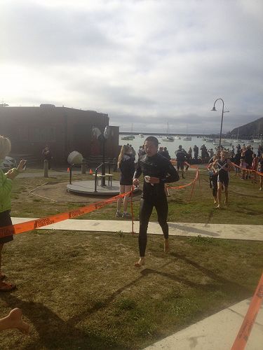 Han Zhang completes the swim leg for the Senior A team