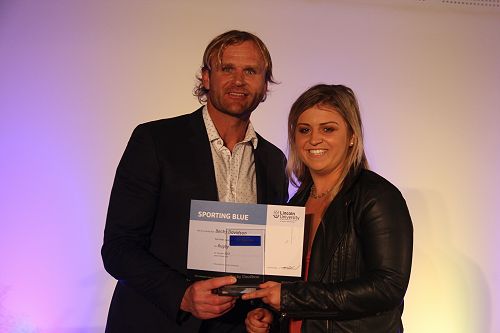 Scott Robertson presents Becky Davidson with her Lincoln University Blue for Rugby
