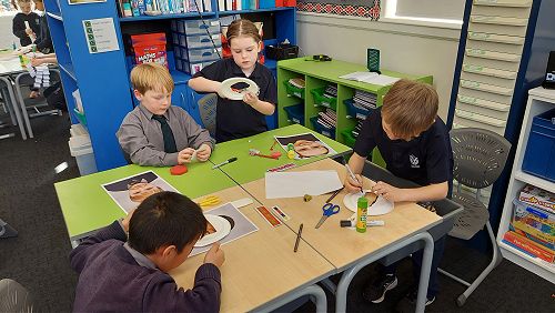 Students creating their astronaut