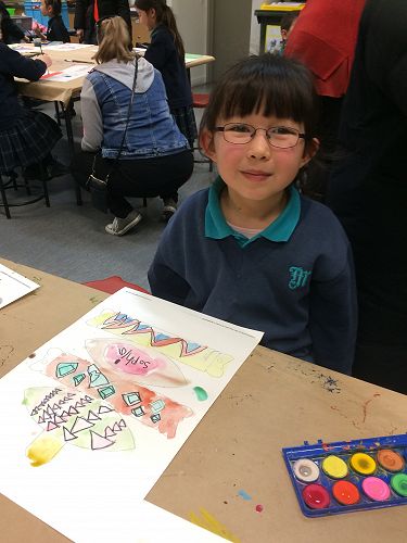 Sophia used the water colour paints to complete her designs.