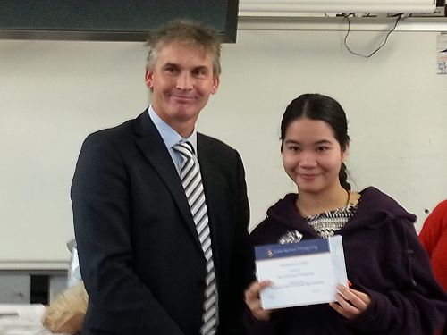Meejung (2015) received Graduation Certificate from Principal of Geraldine High School