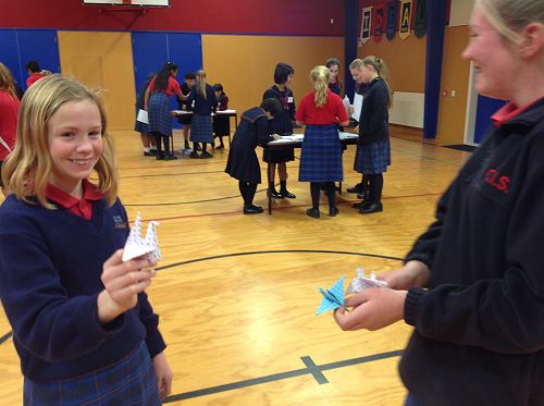 Making origami cranes is easy when a Japanese stud