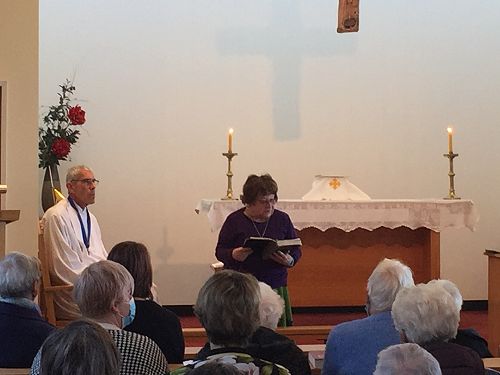 Rev'd Mary Greet reads the scriptures