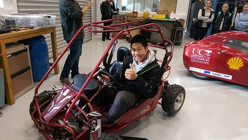 Matthew Kim checking out the electric go cart