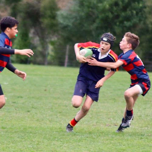 Connor Aldrich runs through a tackle