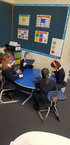 Year 2 students enjoying the new furniture