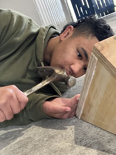 Language Day in Moerewa - Jaris making a gutterboard