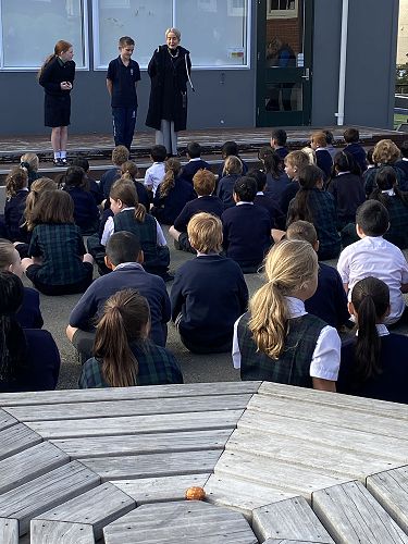 Gwendolyn, Samuel and Mrs Hogg explaining the rules of the Easter egg hunt