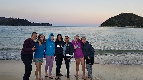 Life's a beach for the waka ama group.