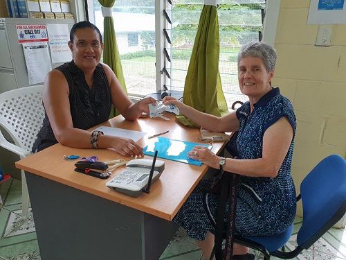 Sr Carmel delivering our funds