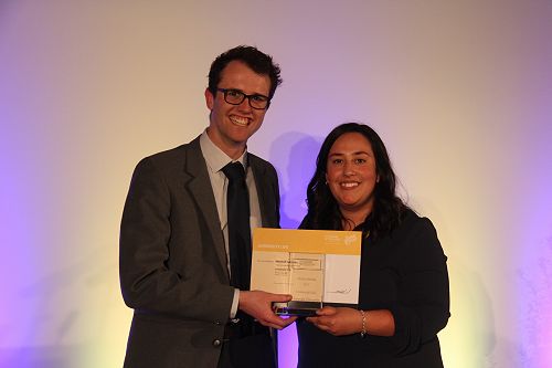 Danyon Thomas presents Hannah Greaves with her Gold Award for University Life