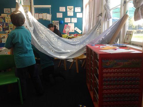 Construction, Action Stations challenges and develops problem solving skills with 4 cardboard tubes and a sheet to work with.  Joshua persists to complete success of his design:-)  Tino pai Joshua!