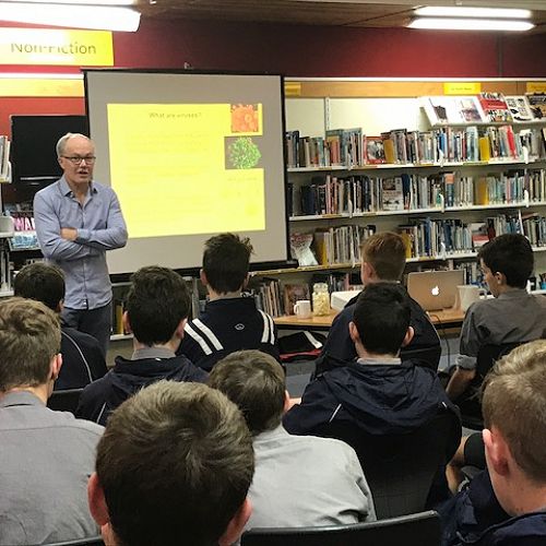 Professor Gregory Cook talks to junior students about viruses as part of the social science programme