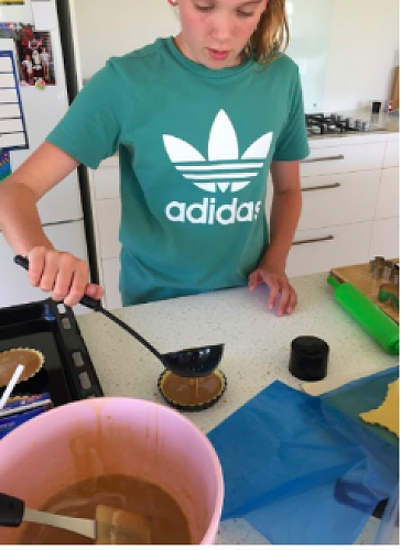 Ella making Canadian Sugar Pies. Yummmmmmmm!