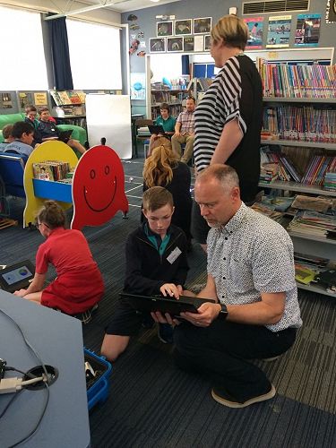 Kobe helping the teachers