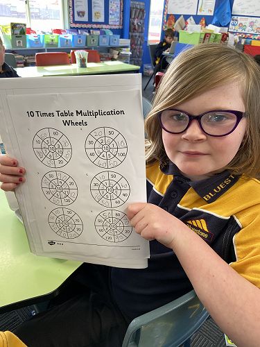 Kortez completed her 10 times table multiplication wheel activity sheet