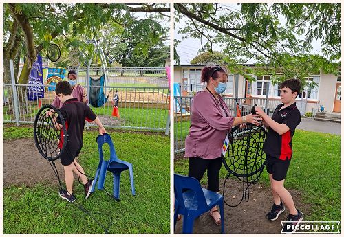 Jacob demonstrates kindness when he helps put the swing up.