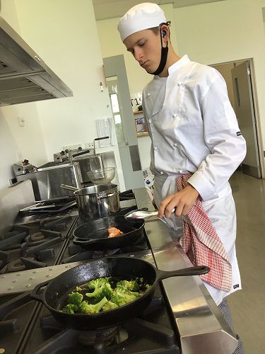 Reid working in the kitchen