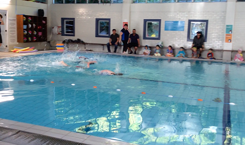 Year 0-2 swimming in their races.