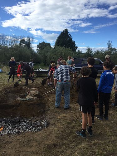 When you put the soil over the pit, you need to fill in the edges first and then cover the top.