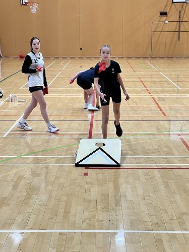 Jeila with an on-target bean bag throw