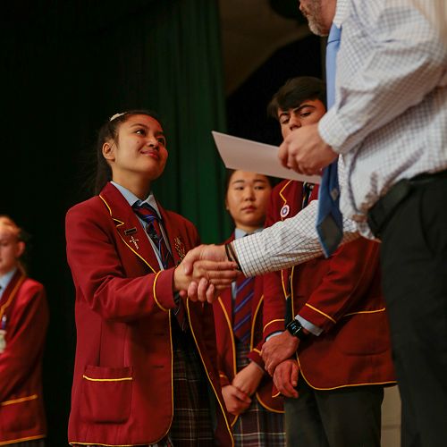 Venice receiving her award from Mr Wilson