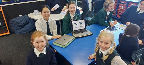 Year 9 class sharing their stories with Year 1-2 Students