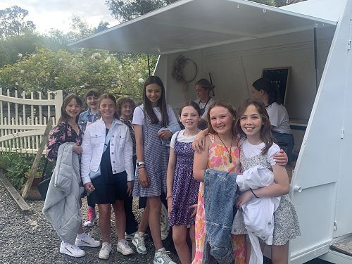 Lining up at the candy floss caravan.