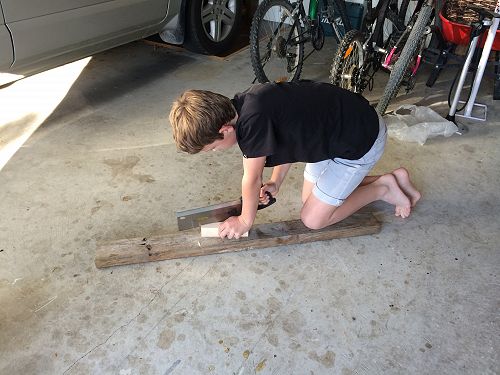 Jack from Room 1 built a wooden car for scouts. He was given 3 pieces of wood and glue. 