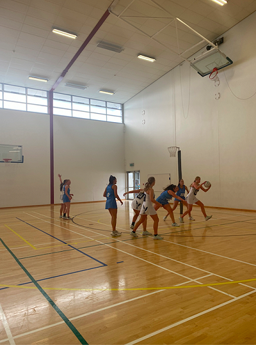 Brenna Lyons receiving a pass 