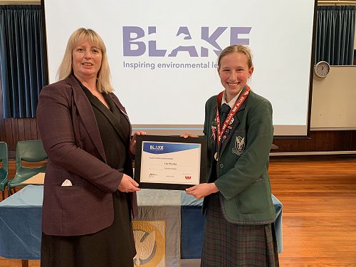 Lila receiving her award at assembly on Monday.