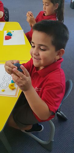 Mixing colours with playdough