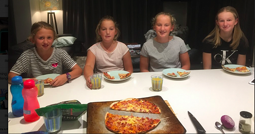 Maddy feeding her hungry sisters and friends. 